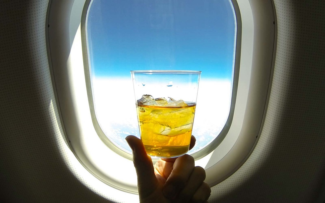 whiskey-liquor-airplane-window-airdrunk0817-1537887142337.jpg