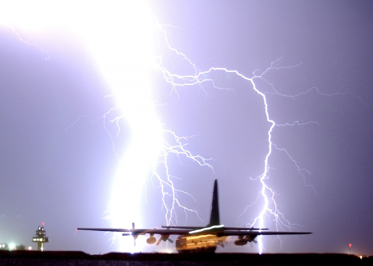 lightning_strike_night_storm_bolt_plane_taxiing_c_130-748208-1551235935657.jpg