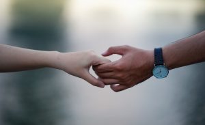 blurred-background-hands-holding-hands-715807-300x183.jpg