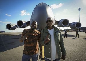 Dave_Chappelle_and_Donnell_Rawlings_stand_in_front_of_a_C-17_Globemaster_III_32666816002-300x214.jpg